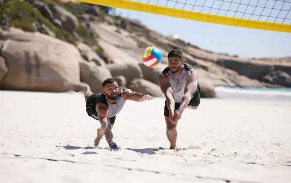 playing_beach_volleyball-min.webp