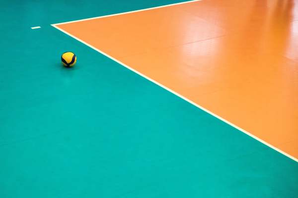 volleyball-court-with-ball-in-sports-hall-top-vie-2023-02-22-02-21-29-utc-min.jpg